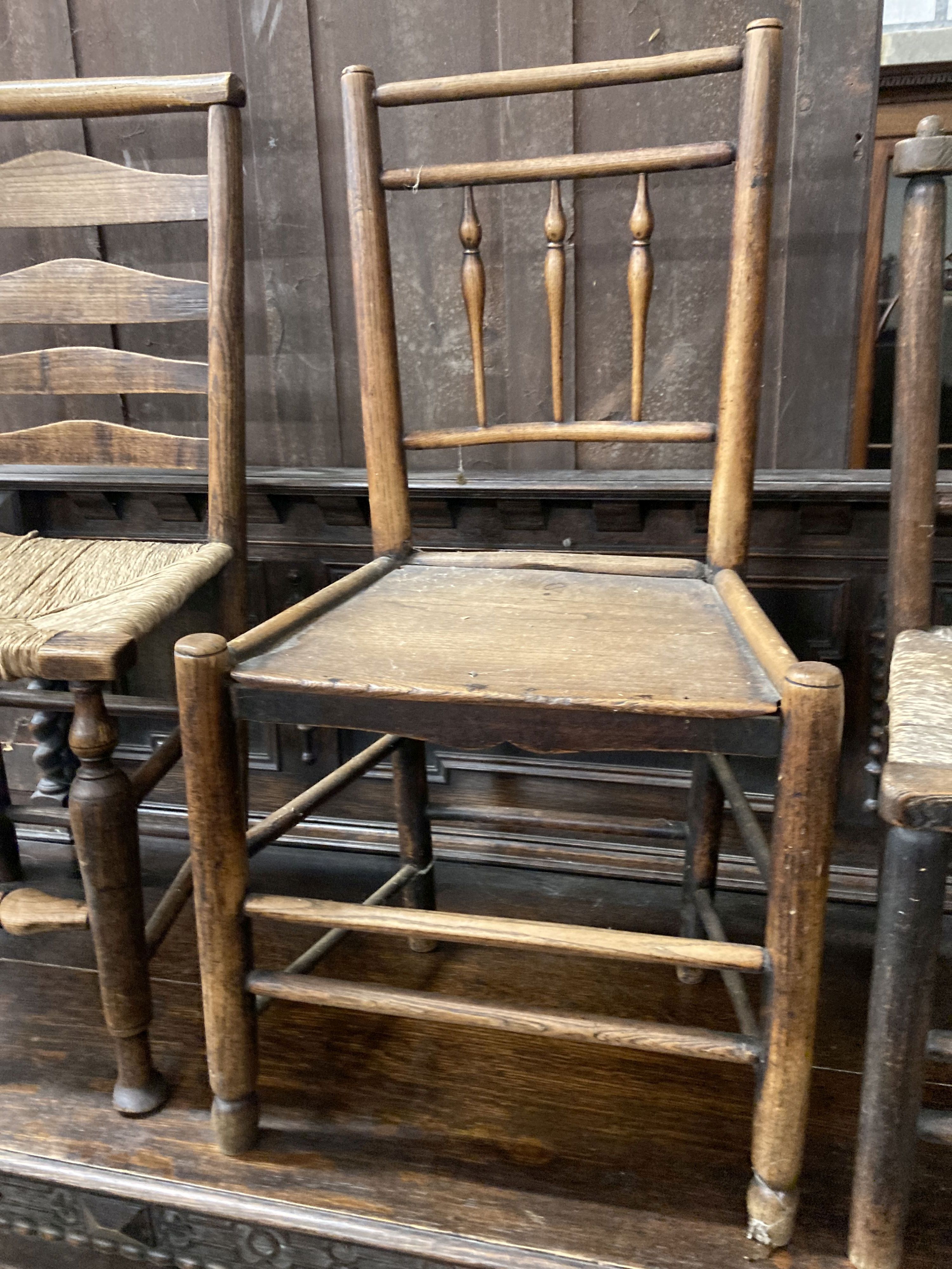 Three 19th century provincial rush and wood seat chairs